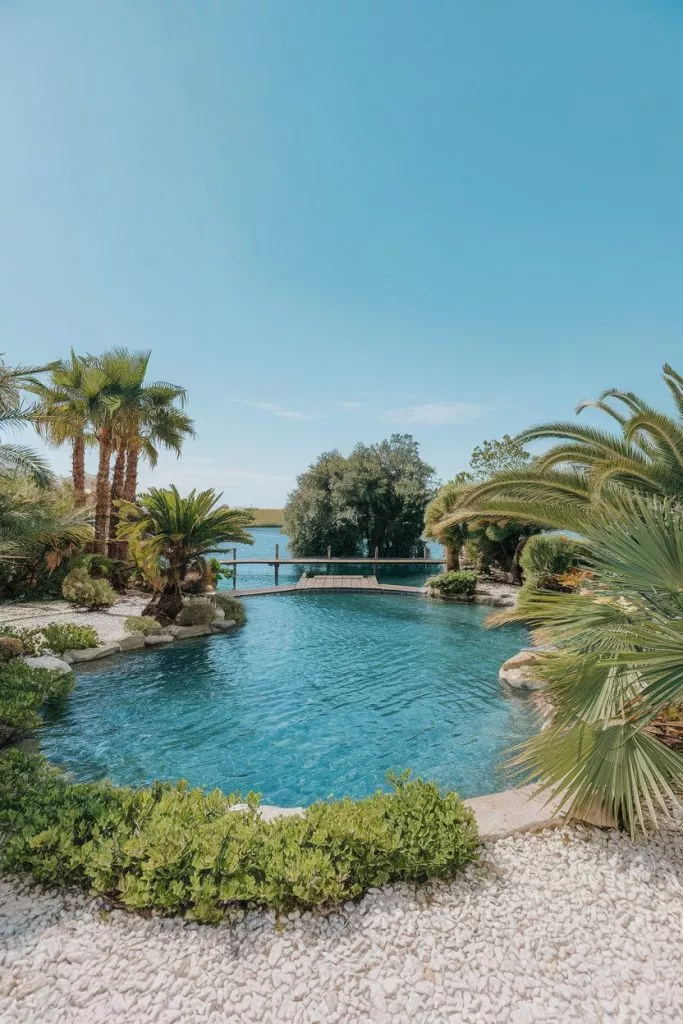 A Photo Of A Serene Oasis With A Clear B Fwzk7bqarga8b0dndx0dya 6snluyqrx6akryoqivxvg